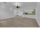 Bright, open-concept living space with hardwood floors that flows into the kitchen at 4722 Blue Mesa Way, Las Vegas, NV 89129