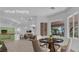 Inviting living space with dining area, providing a great view of the outdoors at 4722 Blue Mesa Way, Las Vegas, NV 89129