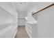 Well-organized walk-in closet with custom shelving and clothing rods at 4722 Blue Mesa Way, Las Vegas, NV 89129