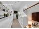 Virtual Staging shows walk-in closet featuring custom shelving and drawers for optimal storage at 4722 Blue Mesa Way, Las Vegas, NV 89129