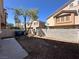 Private backyard with a concrete patio area and fence boundaries at 6080 Golden Corral Trl # 103, Henderson, NV 89011