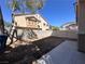 Private backyard featuring block wall, a concrete patio area, and easy landscaping potential at 6080 Golden Corral Trl # 103, Henderson, NV 89011