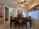 Dining area features a wooden table with seating for four and a large window with lots of natural light at 6080 Golden Corral Trl # 103, Henderson, NV 89011