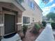 Exterior view of home featuring a neatly landscaped front yard with walkway leading to the front door at 6080 Golden Corral Trl # 103, Henderson, NV 89011