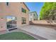 Backyard with a patio and a small patch of turf at 8447 Amherst Valley St, Las Vegas, NV 89123
