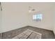 Well-lit bedroom with a ceiling fan and carpeted floor at 8447 Amherst Valley St, Las Vegas, NV 89123
