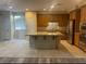 Spacious kitchen features granite countertops, stainless steel appliances, and a central island at 8584 Garnet Lake Ave, Las Vegas, NV 89113