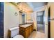 Bathroom vanity with a sink, and tile floor with a door to the bedroom at 100 Underhill Ct, Las Vegas, NV 89145