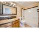Bathroom featuring tiled floors, granite countertop, and a shower-tub combo at 100 Underhill Ct, Las Vegas, NV 89145