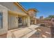 Front entrance featuring a decorative security door and landscaped area, offering curb appeal at 100 Underhill Ct, Las Vegas, NV 89145