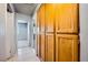 Hallway featuring tile flooring and plenty of storage space at 100 Underhill Ct, Las Vegas, NV 89145