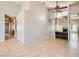 Spacious living room with tile flooring and a partial mirror wall design at 100 Underhill Ct, Las Vegas, NV 89145