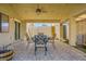 Outdoor space offering a patio with seating and a well-maintained yard at 100 Underhill Ct, Las Vegas, NV 89145