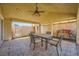 Patio offering outdoor living with tile flooring and a comfortable seating area at 100 Underhill Ct, Las Vegas, NV 89145