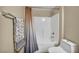Bright bathroom with a shower-tub, towel rack and new toilet at 10550 W Alexander Rd # 2103, Las Vegas, NV 89129
