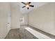 Spacious bedroom with neutral walls, carpet, and a ceiling fan at 10550 W Alexander Rd # 2103, Las Vegas, NV 89129