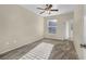 Bright bedroom with neutral walls, carpet, and a ceiling fan at 10550 W Alexander Rd # 2103, Las Vegas, NV 89129