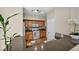 Kitchen with stainless steel appliances, modern fixtures, and wooden cabinets at 10550 W Alexander Rd # 2103, Las Vegas, NV 89129