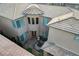 Aerial view of a property displaying a private patio, light-colored roof and multiple windows at 12439 Iron Bluff Ave, Las Vegas, NV 89138