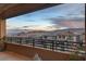 This home has a gorgeous mountain view from the balcony with iron railings and a covered patio at 12439 Iron Bluff Ave, Las Vegas, NV 89138