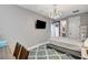 Inviting bedroom with stylish decor, modern lighting, and a flat-screen TV at 12439 Iron Bluff Ave, Las Vegas, NV 89138