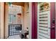 Inviting courtyard featuring a gate and a lantern, enhancing outdoor charm and security at 12439 Iron Bluff Ave, Las Vegas, NV 89138