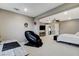 Expansive main bedroom featuring a sitting area and neutral color palette at 12439 Iron Bluff Ave, Las Vegas, NV 89138