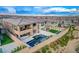 A well-appointed pool, spa, and outdoor living space at 12439 Iron Bluff Ave, Las Vegas, NV 89138
