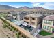 Gorgeous backyard with pool, spa, fire feature, and mountain views at 12439 Iron Bluff Ave, Las Vegas, NV 89138