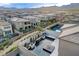An eye-catching backyard with a modern pool, spa and fire feature at 12439 Iron Bluff Ave, Las Vegas, NV 89138