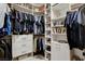 Organized walk-in closet with custom shelving and ample storage space at 12439 Iron Bluff Ave, Las Vegas, NV 89138