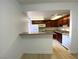 Spacious kitchen with breakfast bar, sleek countertops, and ample cabinet space at 4421 Alexis Dr # 429, Las Vegas, NV 89103