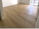 Spacious living room with light wood-look flooring and ample natural light at 4421 Alexis Dr # 429, Las Vegas, NV 89103