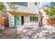 Backyard area with concrete, brick wall, and small patio area at 10235 Headrick Dr, Las Vegas, NV 89166