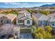 Charming two-story home with a tile roof and manicured landscaping at 10235 Headrick Dr, Las Vegas, NV 89166