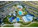 Aerial view of community with pool, splash pad, community center and ample parking at 10332 Stroma Ave, Las Vegas, NV 89166