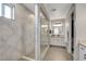 A modern bathroom features a glass walk-in shower at 10332 Stroma Ave, Las Vegas, NV 89166
