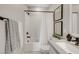 Cozy bathroom with modern fixtures, a shower/tub combo, and minimalist decor for a clean and relaxing space at 10332 Stroma Ave, Las Vegas, NV 89166