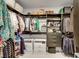 Walk-in closet with custom shelving and plenty of storage space at 10332 Stroma Ave, Las Vegas, NV 89166