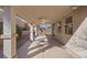 A covered back patio with ceiling fans and plenty of room for entertaining at 1047 Amber Gate St, Henderson, NV 89002