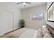 Bright bedroom with carpet floors, closet and window providing natural light at 1047 Amber Gate St, Henderson, NV 89002