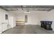 Spacious two-car garage providing ample storage with installed shelving and room for appliances at 1047 Amber Gate St, Henderson, NV 89002