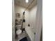 This bathroom is cozy with a shower, a bathtub and good storage at 10657 San Vercelli Ct, Las Vegas, NV 89141