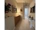 Hallway with decorative accents and lighting, leading to additional spaces at 10657 San Vercelli Ct, Las Vegas, NV 89141