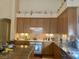 Kitchen with wooden cabinets and countertops, featuring a decorative backsplash at 10657 San Vercelli Ct, Las Vegas, NV 89141