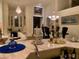 Elegant living room featuring high ceilings, artwork, and stylish furniture at 10657 San Vercelli Ct, Las Vegas, NV 89141