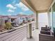 Balcony view overlooking a quiet street and neighborhood with outdoor seating at 10806 Space Odyssey Ave, Las Vegas, NV 89129