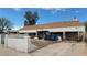 Modest single-story home with a brown-tiled roof and unique rock facade at 116 Continental Ave, Henderson, NV 89015