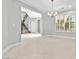 Bright dining room showing access to other parts of the house at 133 S Buteo Woods Ln, Las Vegas, NV 89144