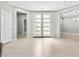 Bright foyer with tiled flooring and modern double doors at 133 S Buteo Woods Ln, Las Vegas, NV 89144